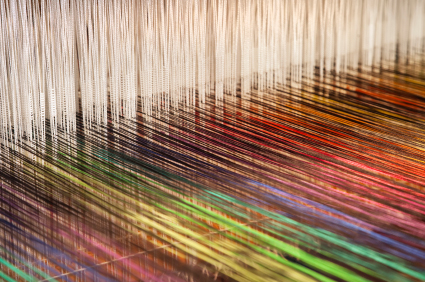 Colorful yarn being sewn together